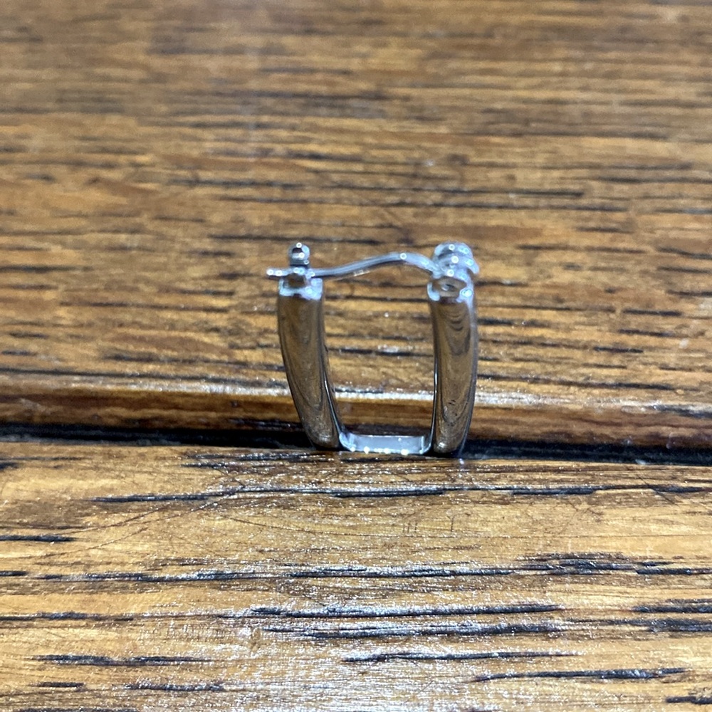 Silver 1.5 in rectangle pierced earrings. Very secure and light. They are pretty - Picture 4 of 12